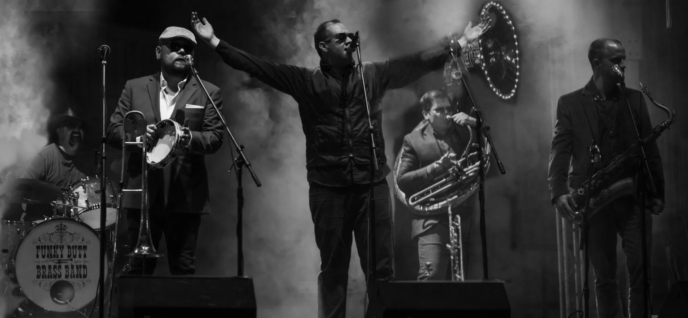 Black and white photo of a funky jazz band on stage