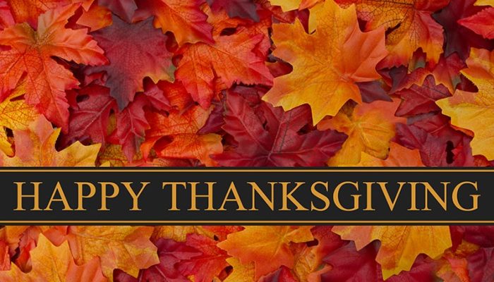 Happy Thanksgiving Greeting, Fall Leaves Background and text Happy Thanksgiving
